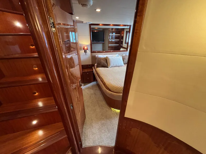 Slide: The Image of Luxurious Norseman 80 yacht interior with elegant wood finishes, cozy bedroom, and modern amenities. - 40