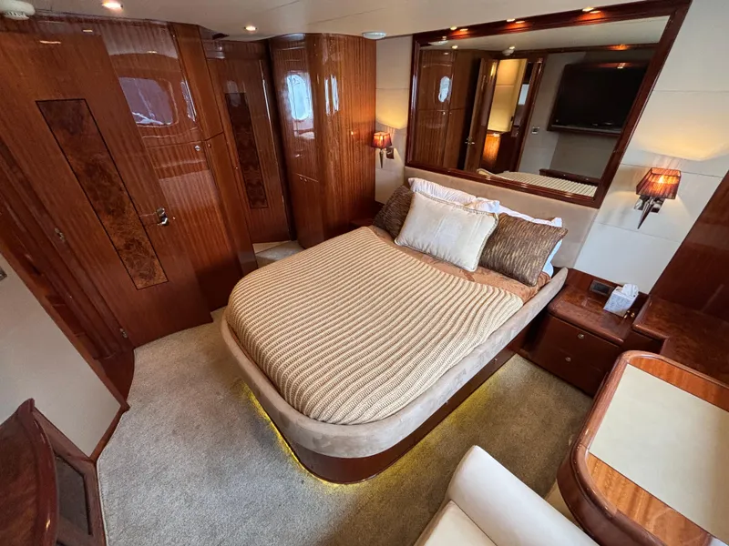 Slide: The Image of Luxurious bedroom interior of 2010 Norseman 80 yacht with elegant wood finishes. - 44