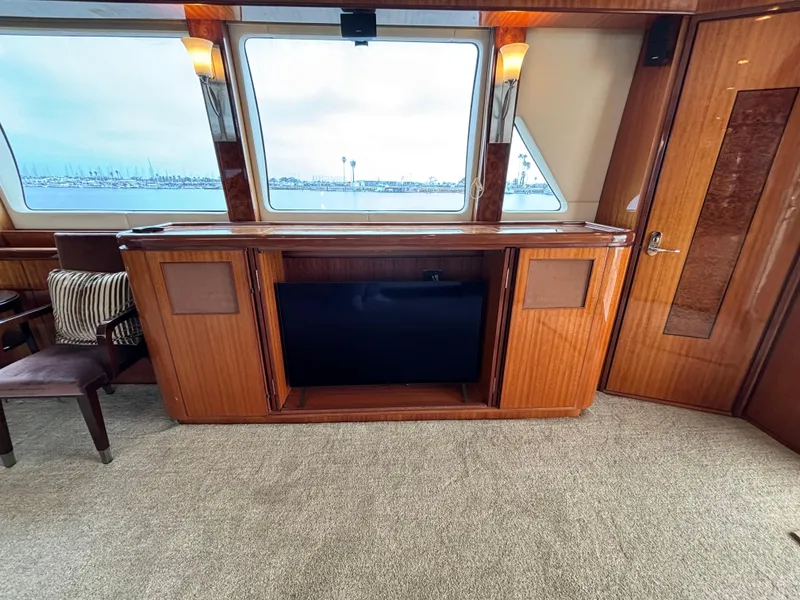 Slide: The Image of Luxurious interior of 2010 Norseman 80 yacht with wooden cabinetry and large windows. - 9