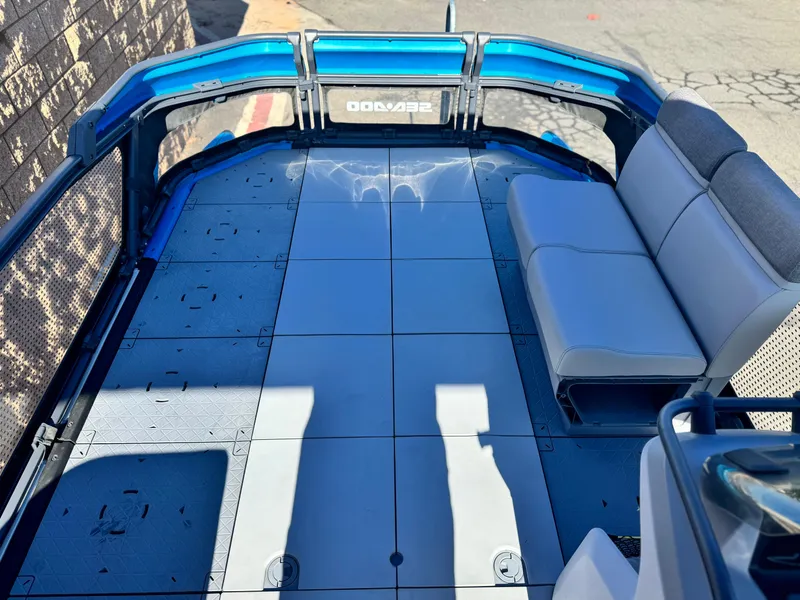 Slide: The Image of 2023 Sea-Doo Switch Cruise 21 deck with seating, showcasing spacious and modern design. - 10