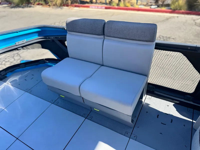 Slide: The Image of 2023 Sea-Doo Switch Cruise 21 interior seating with gray upholstery. - 11