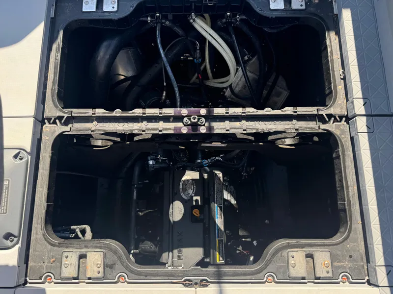 Slide: The Image of 2023 Sea-Doo Switch Cruise 21 engine compartment with visible components and wiring. - 19