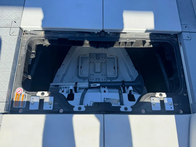 Slide: The Image of Open storage compartment of 2023 Sea-Doo Switch Cruise 21 watercraft. - 20