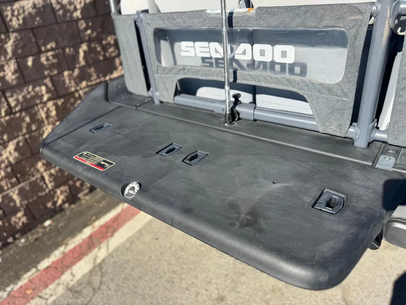 Slide: The Image of 2023 Sea-Doo Switch Cruise 21 rear platform with logo and textured surface. - 8