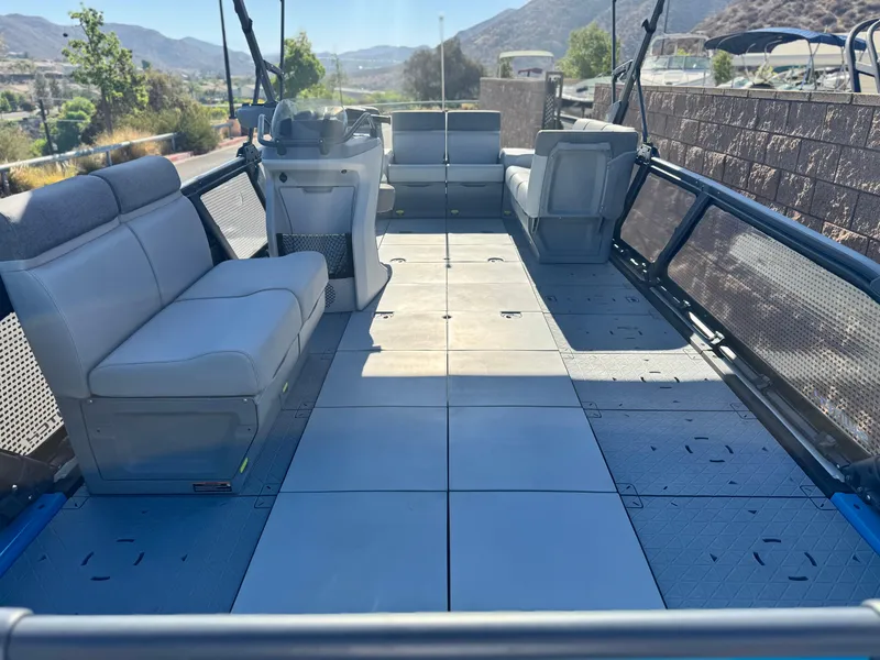 Slide: The Image of 2023 Sea-Doo Switch Cruise 21 interior with spacious seating and open deck. - 9