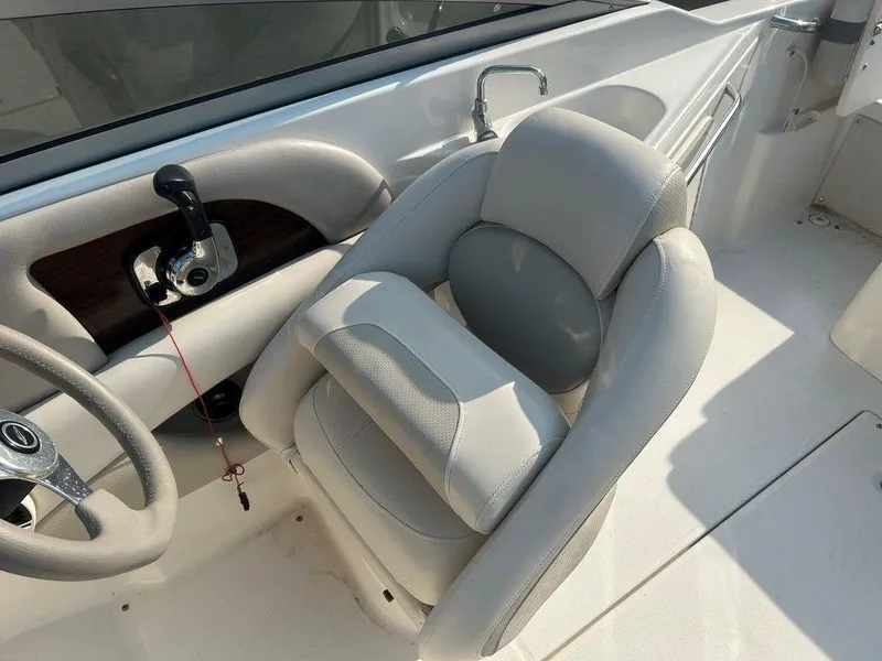 Slide: The Image of 2008 Chaparral 215 SSi boat interior with steering wheel and control panel. - 20