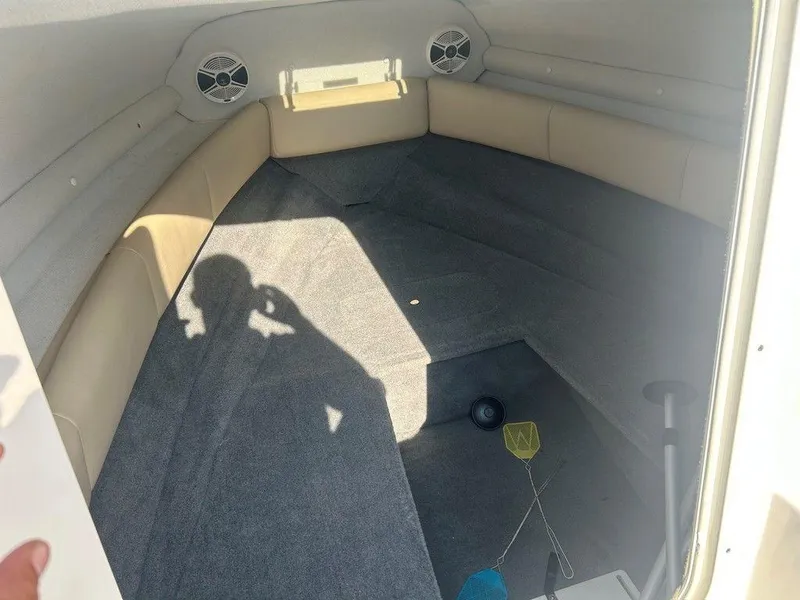 Slide: The Image of Interior cabin of 2008 Chaparral 215 SSi boat with carpet and seating. - 31