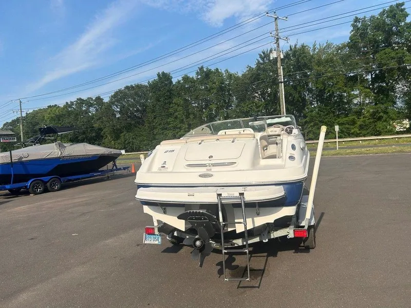 Slide: The Image of 2008 Chaparral 215 SSi boat on trailer in parking lot, sunny day. - 7