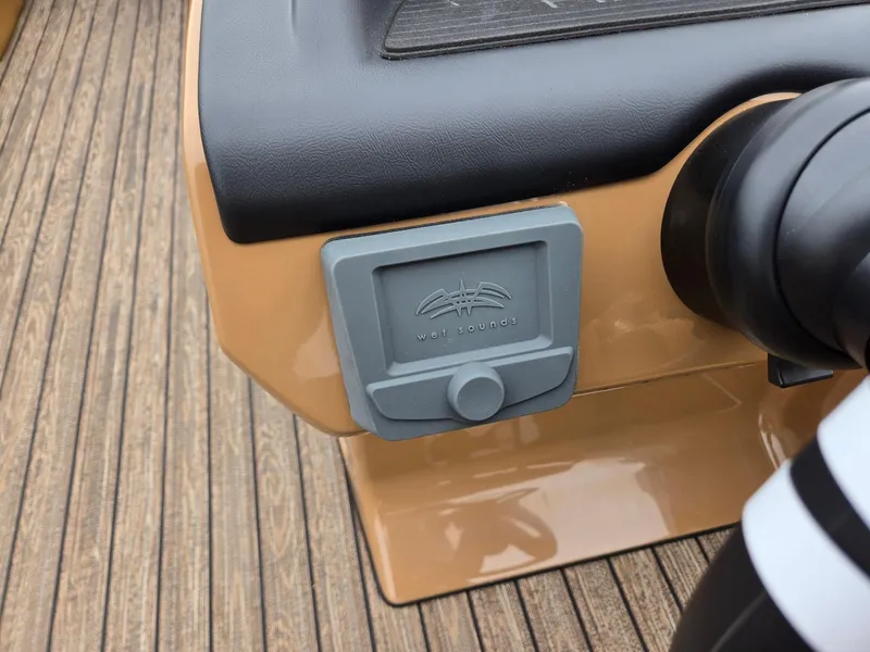 Slide: The Image of 2026 Harris Cruiser 210 boat dashboard with Wet Sounds audio control. - 19