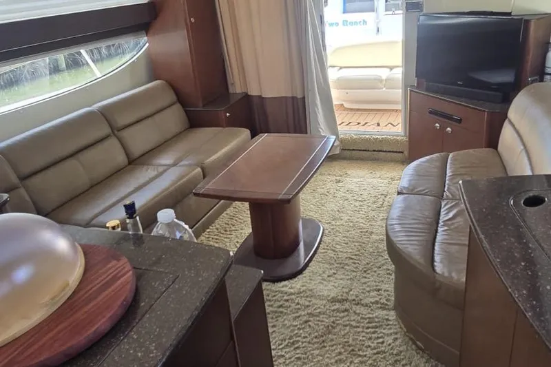 Slide: The Image of Interior of 2012 Meridian 341 Sedan yacht with plush seating and modern amenities. - 14