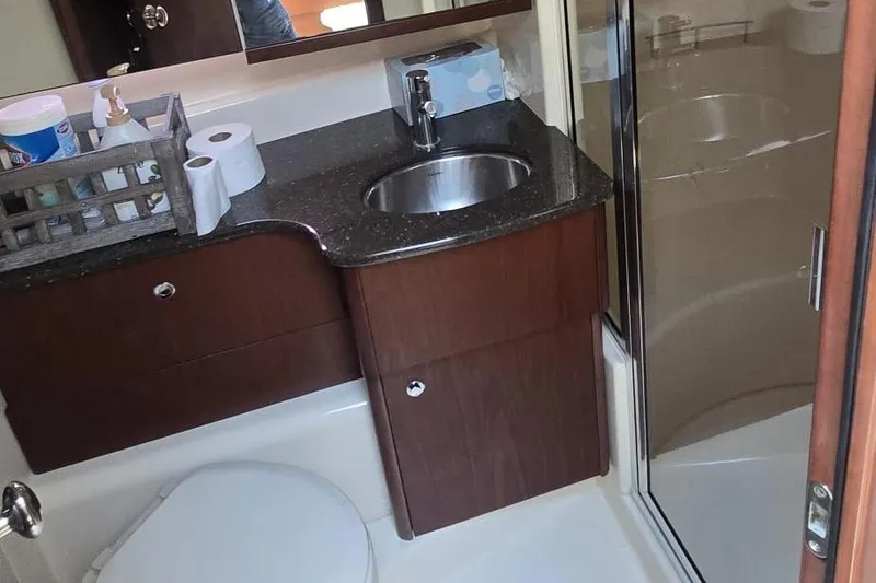 Slide: The Image of Bathroom in 2012 Meridian 341 Sedan with sink, toilet, and shower. - 18