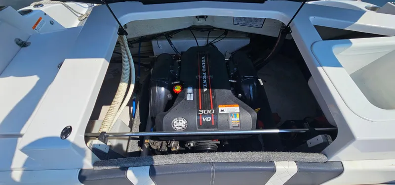 Slide: The Image of 2014 Glastron GT 245 boat engine compartment with Volvo Penta 300 V8 engine. - 19