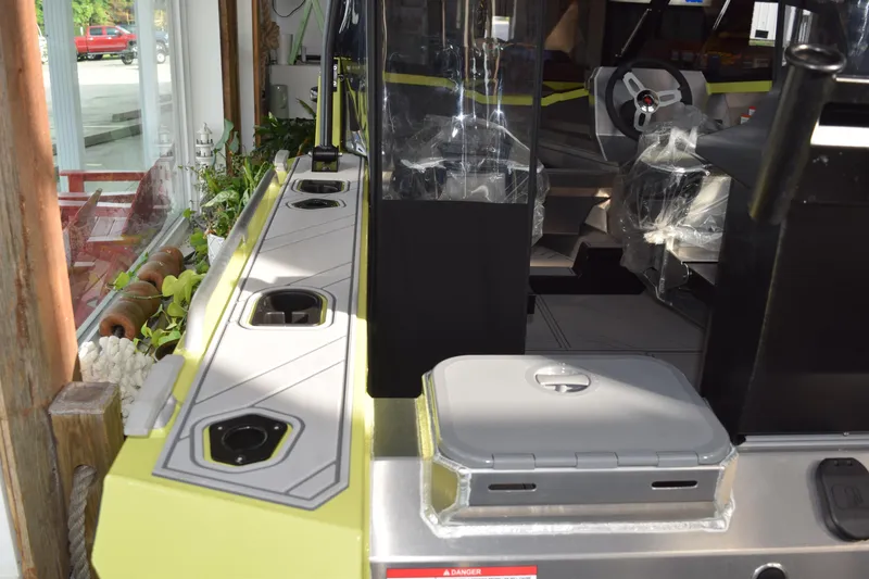 Slide: The Image of 2026 Stabicraft 1550 Fisher Offshore boat interior with steering wheel and seating. - 24