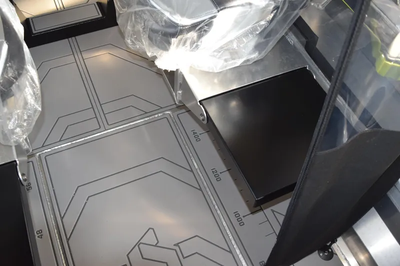 Slide: The Image of Interior of 2026 Stabicraft 1550 Fisher Offshore, featuring sleek, modern flooring design. - 7