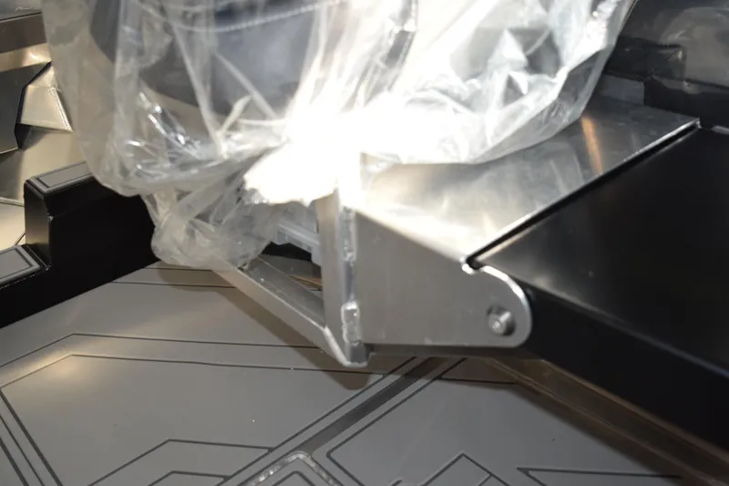 Slide: The Image of 2026 Stabicraft 1550 Fisher Offshore boat detail, showcasing sleek metal and plastic components. - 9