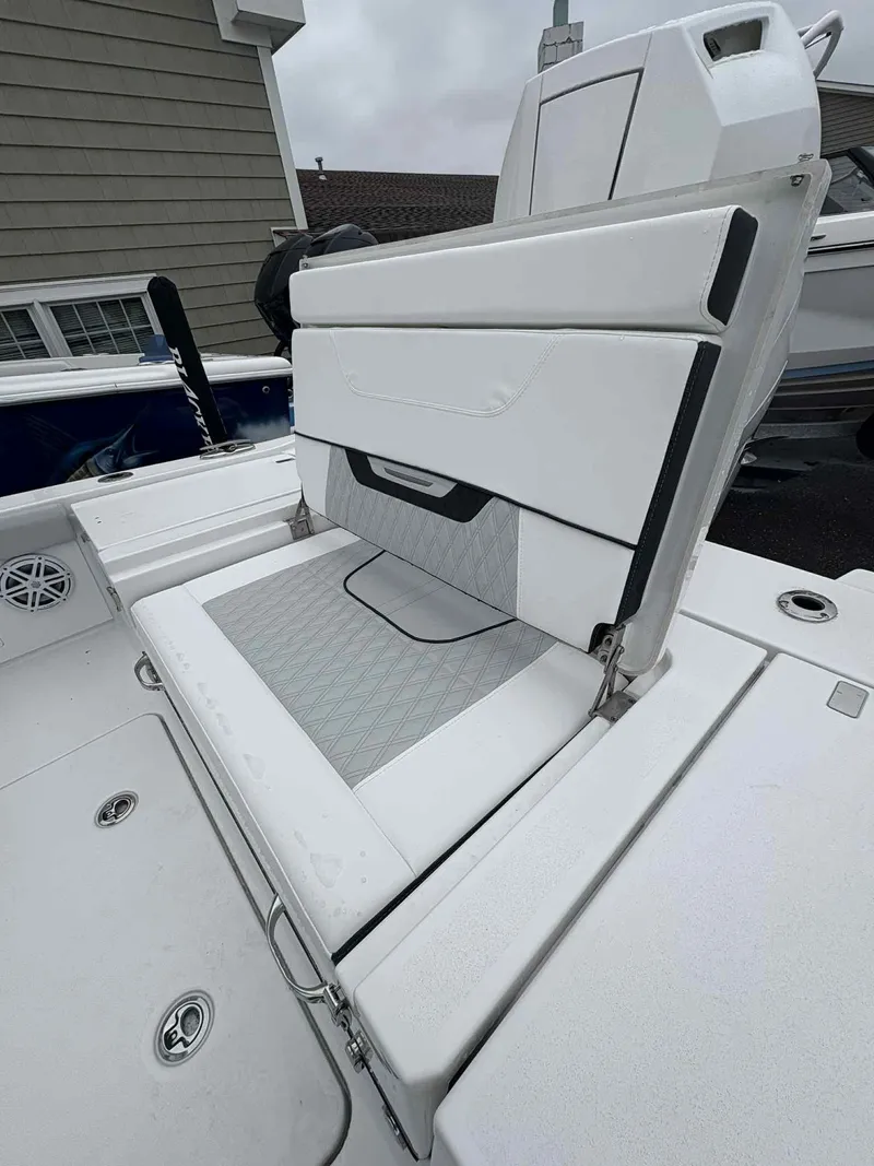 Slide: The Image of 2026 Blackfin 262 HB boat seat with white and gray upholstery, showcasing modern design. - 4