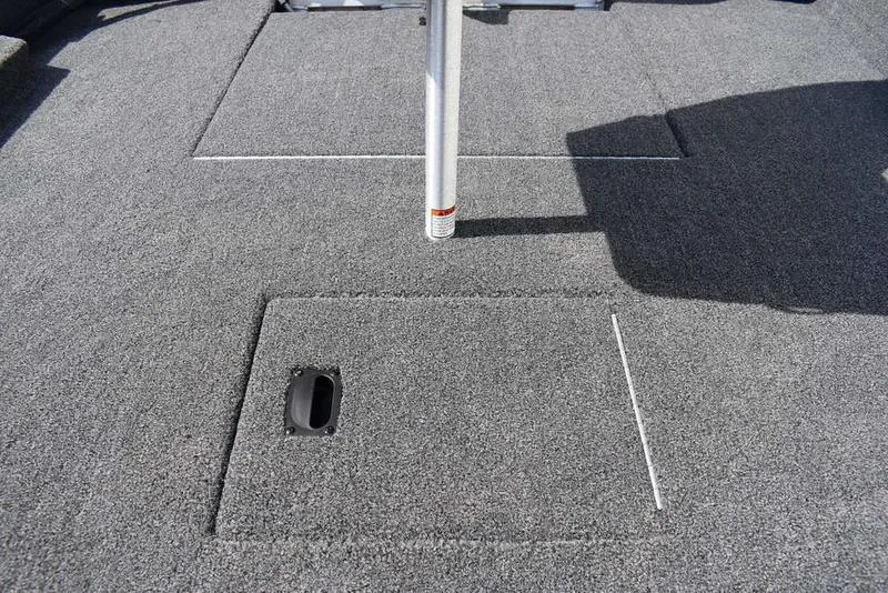 Slide: The Image of 2026 Lowe Skorpion 17 boat deck with storage compartments and pole mount. - 31