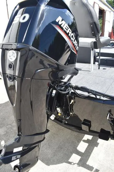 Slide: The Image of 2026 Lowe Skorpion 17 boat with Mercury outboard motor, close-up view. - 5