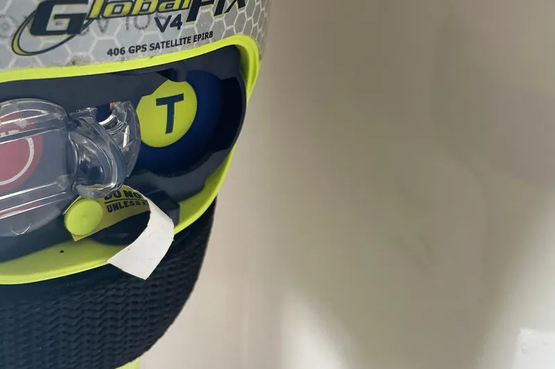 Slide: The Image of EPIRB device on Jupiter 26 FS, 2015 model, featuring GlobalFix V4 GPS technology. - 39