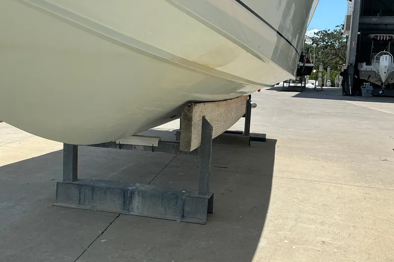 Slide: The Image of 2015 Jupiter 26 FS boat hull on dry dock support. - 60