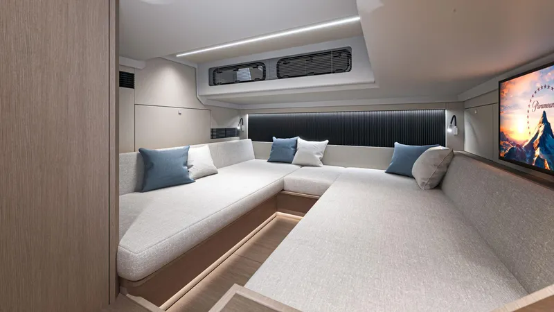 Slide: The Image of Luxurious interior of 2026 Beneteau Gran Turismo 40 yacht with modern seating and TV. - 11