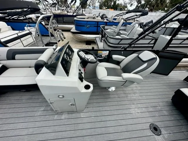 Slide: The Image of 2023 Viaggio Lago C boat interior with modern helm and seating. - 3