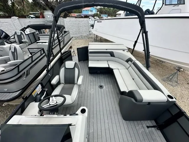 Slide: The Image of 2023 Viaggio Lago C pontoon boat with spacious seating and modern design. - 4