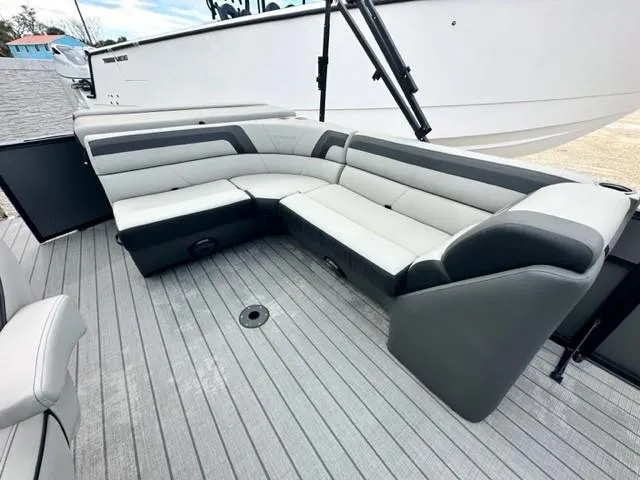 Slide: The Image of 2023 Viaggio Lago C boat with sleek gray seating and modern deck design. - 5