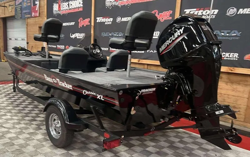 Slide: The Image of 2026 Tracker BASS TRACKER® Classic XL boat with Mercury engine on display. - 3