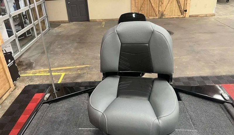 Slide: The Image of 2026 Tracker BASS TRACKER® Classic XL boat seat in showroom setting. - 7