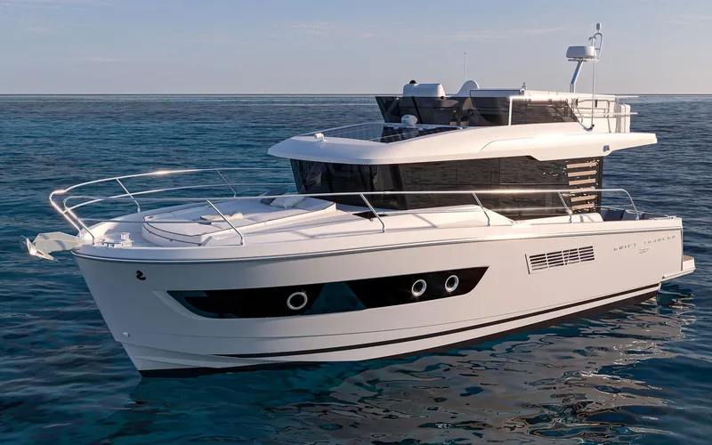 Slide: The Image of 2026 Beneteau 37 Swift Trawler cruising on calm ocean waters. - 2