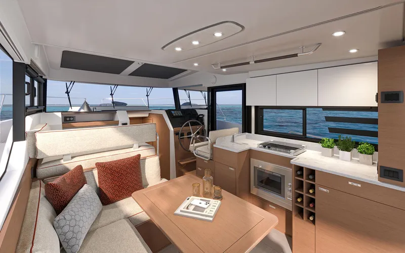Slide: The Image of Luxurious interior of 2026 Beneteau 37 Swift Trawler with modern kitchen and seating area. - 7