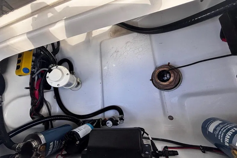 Slide: The Image of 2026 Tidewater 256 CC Adventure boat interior wiring and components. - 30