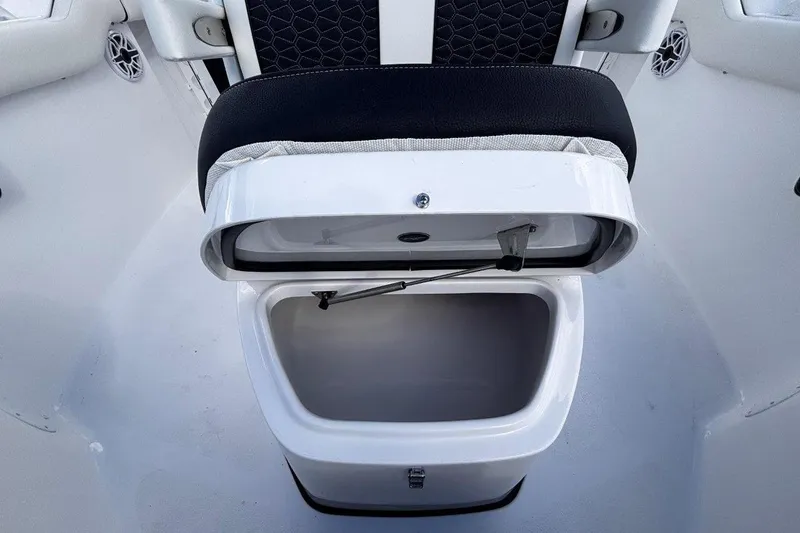 Slide: The Image of Open storage compartment on 2026 Tidewater 256 CC Adventure boat. - 33
