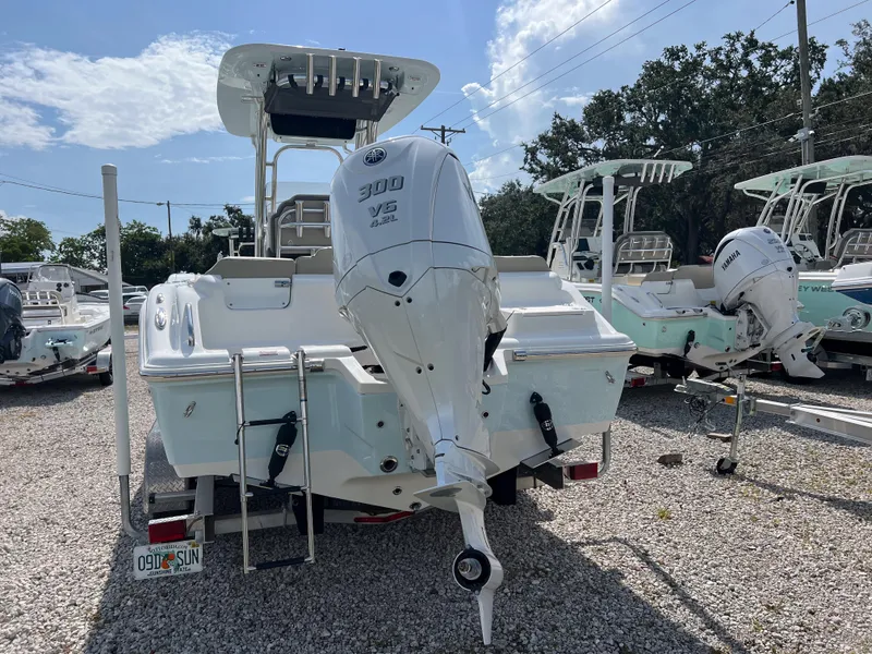 Slide: The Image of 2025 Key West 239 FS boat with Yamaha 300 V6 engine, displayed outdoors. - 3