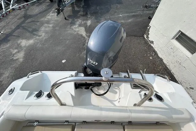 Slide: The Image of 2013 Sea Hunt Escape 211 LE boat with outboard motor, viewed from above. - 18