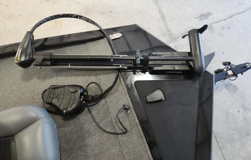 Slide: The Image of 2024 Tracker Pro 170 boat with Minn Kota trolling motor on deck. - 8