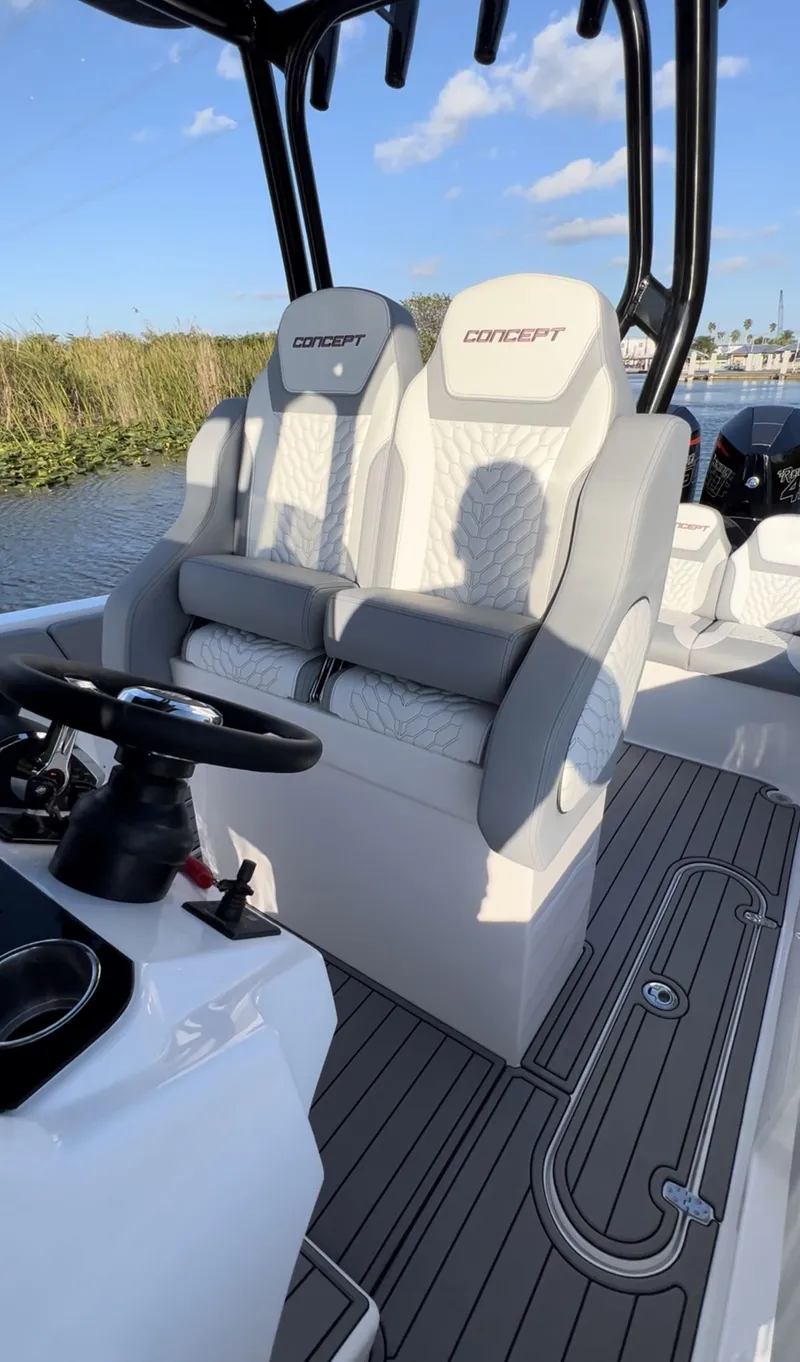 Slide: The Image of 2023 Concept 32' CC boat interior with sleek seating and modern design. - 3