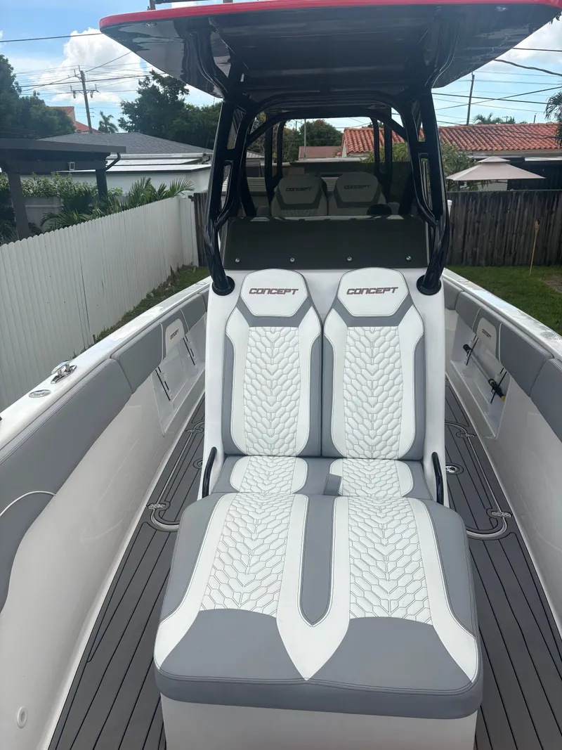 Slide: The Image of 2023 Concept 32' CC boat interior with stylish white and gray seating. - 4