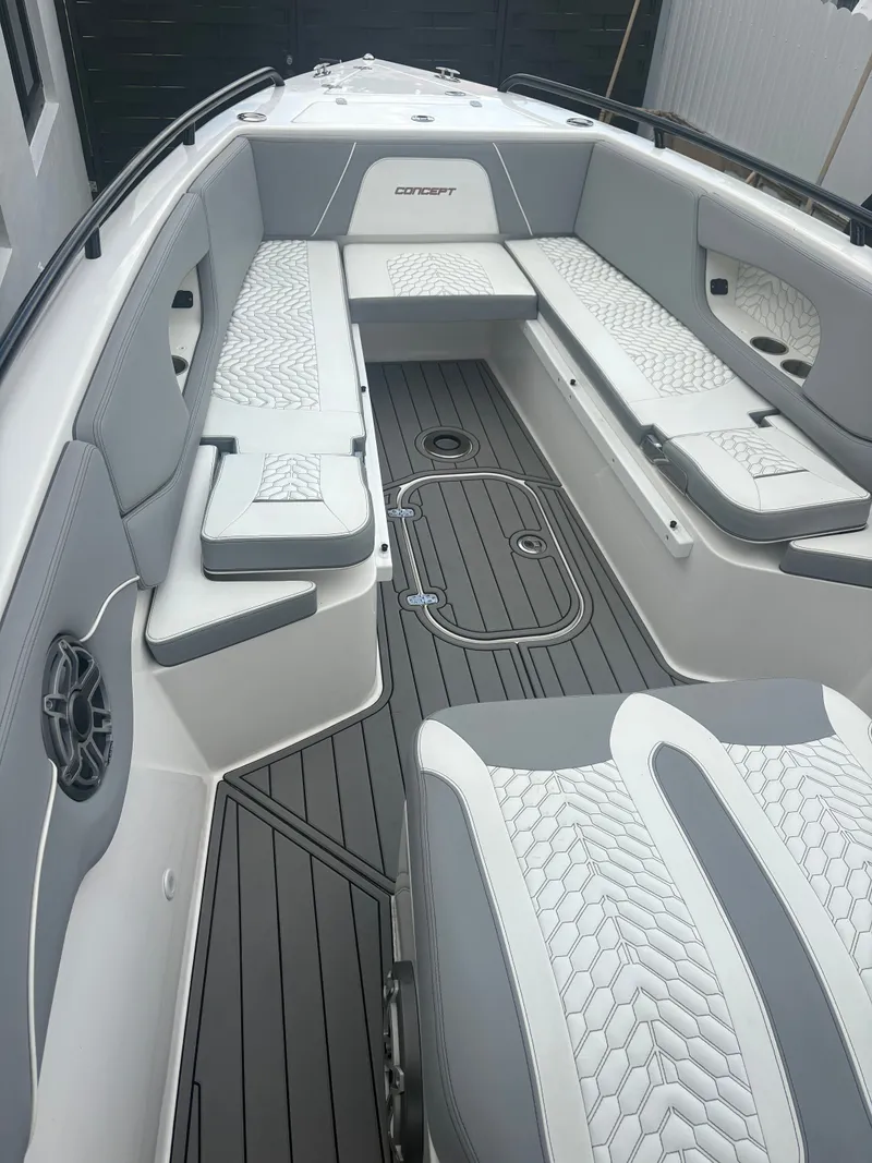 Slide: The Image of 2023 Concept 32' CC boat interior with sleek seating and modern design. - 5