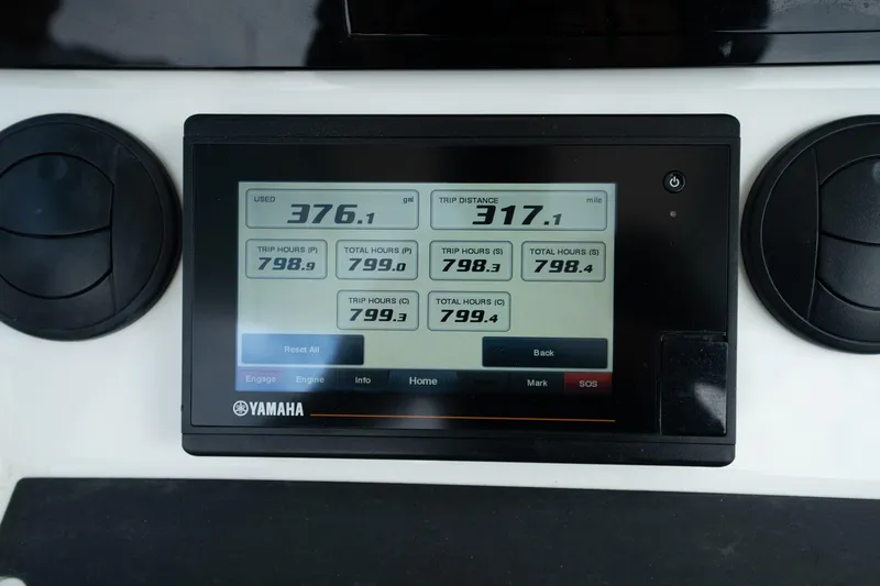 Slide: The Image of Yamaha display on 2019 Regulator 34 Center Console showing fuel and trip data. - 10