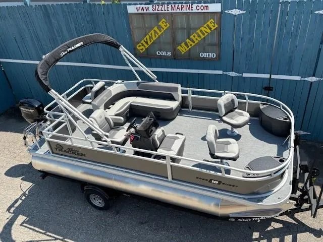 The Image of 2026 Sun Tracker Bass Buggy 18 DLX pontoon boat on trailer at Sizzle Marine dealership. - 0