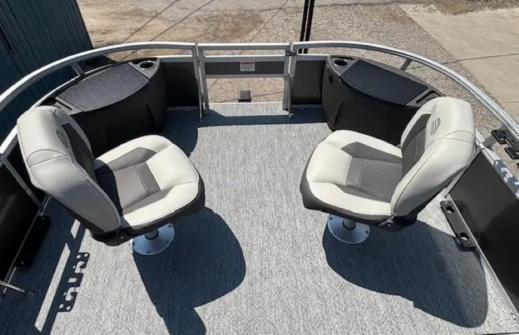 Slide: The Image of 2026 Sun Tracker Bass Buggy 18 DLX pontoon boat with two swivel seats on deck. - 10
