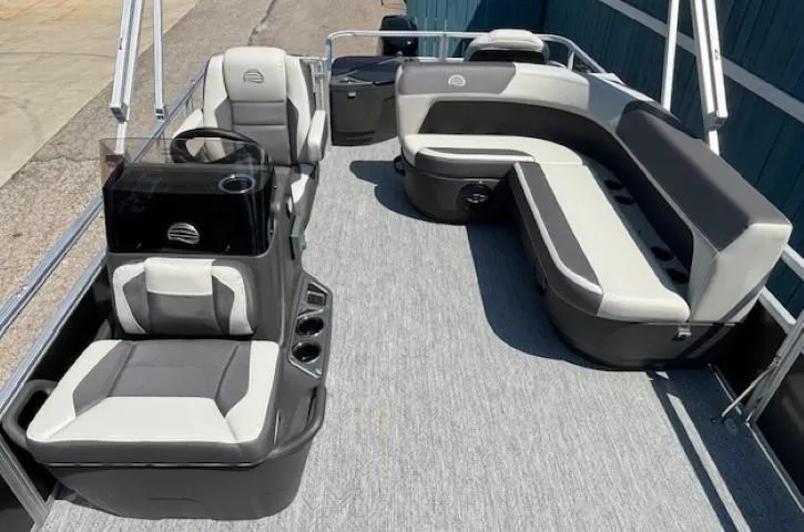 Slide: The Image of 2026 Sun Tracker Bass Buggy 18 DLX pontoon boat with spacious seating and modern design. - 17