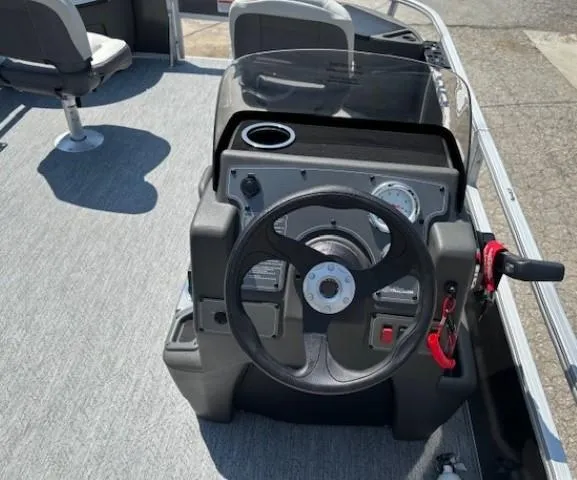 Slide: The Image of Steering console of 2026 Sun Tracker Bass Buggy 18 DLX pontoon boat. - 23
