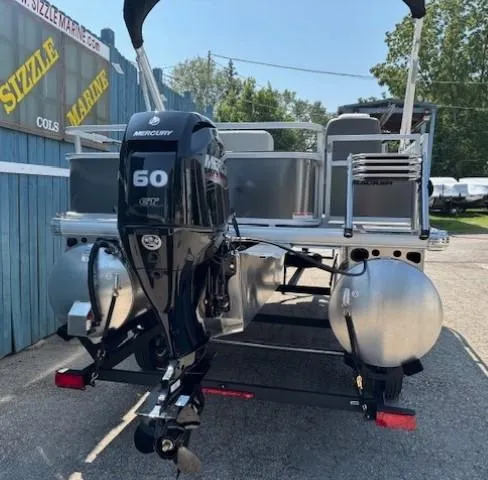 Slide: The Image of 2026 Sun Tracker Bass Buggy 18 DLX pontoon boat with Mercury 60 HP outboard motor. - 6