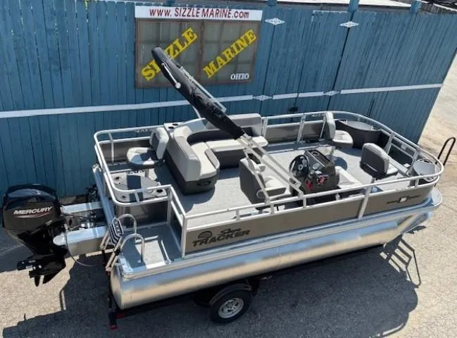 Slide: The Image of 2026 Sun Tracker Bass Buggy 18 DLX pontoon boat with Mercury engine at Sizzle Marine. - 9