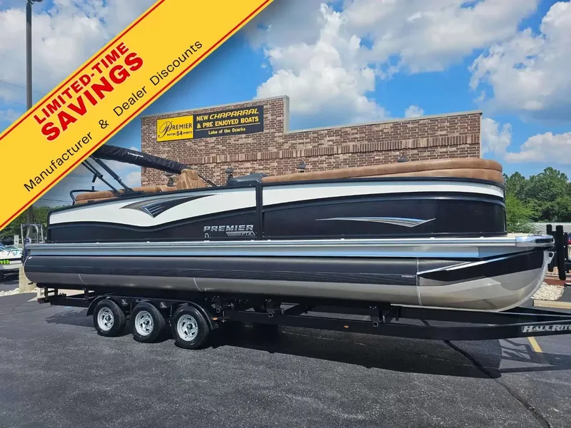 The Image of The image shows a Premier 270 Intrigue RF boat on a trailer in front of a building. A yellow banner with "LIMITED-TIME SAVINGS" is overlaid. - 1