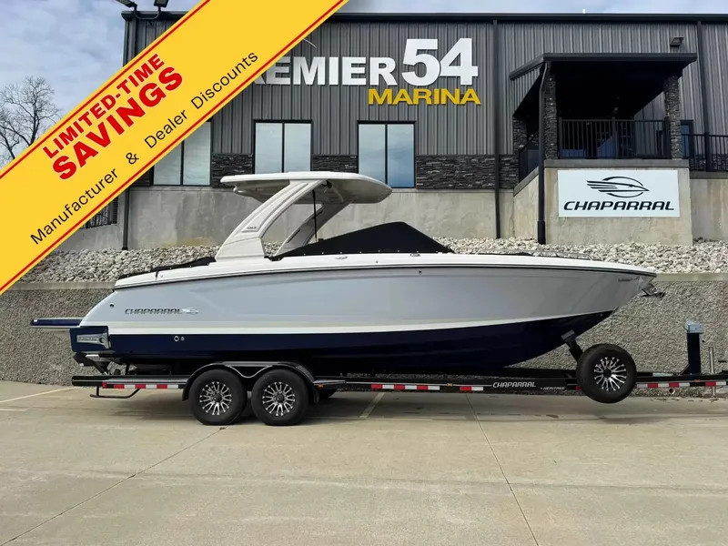 The Image of 2025 Chaparral 30 Surf on a trailer in front of a modern building. - 1