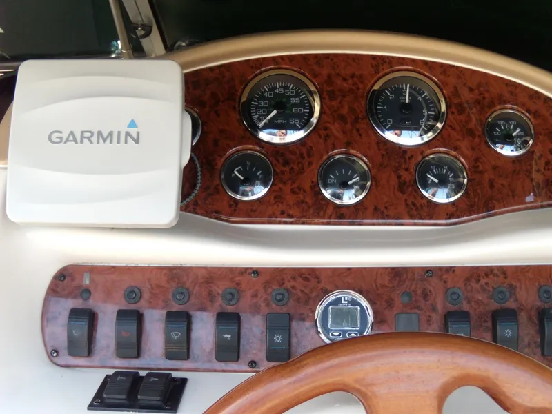 Slide: The Image of Dashboard of 2001 Sea Ray 260 Bow Rider Select with Garmin navigation system. - 11